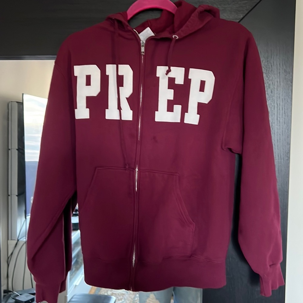 Very comfy boys zip up high school sweatshirt.